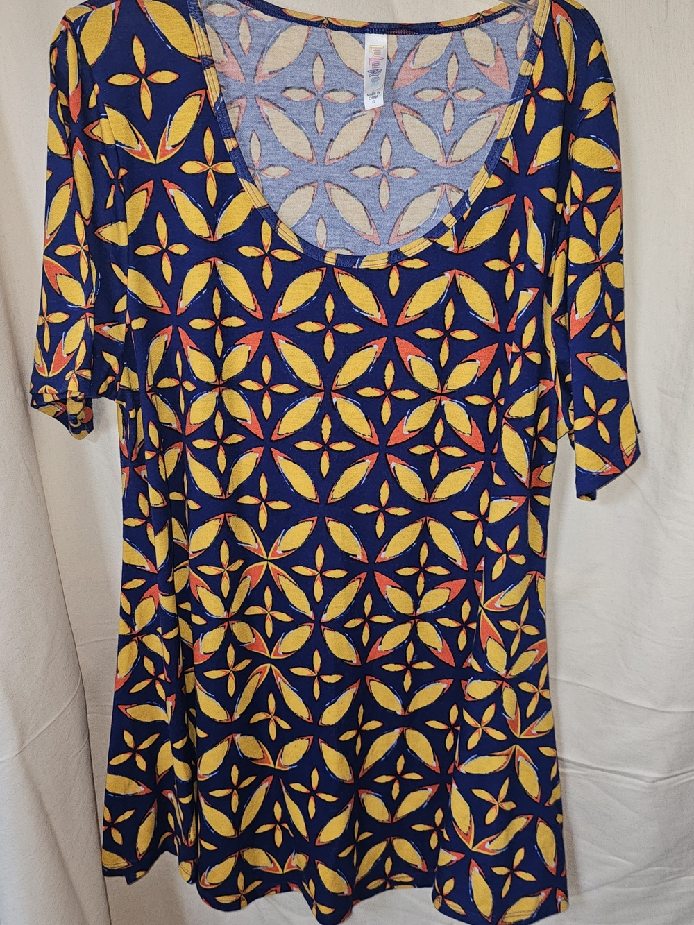 LuLaRoe Navy Scoop Neck Tunic with Yellow and Red Geometric Print